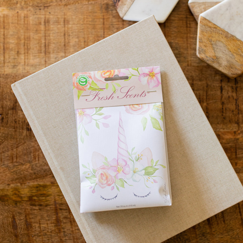 Unicorn Fresh Scents Fragranced Sachet on Tan Book