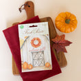 Load image into Gallery viewer, Welcome Fall Fresh Scents 3pk fall scented sachet on cutting board with pumpkin
