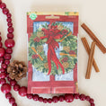 Load image into Gallery viewer, Red Door Wreath Fresh Scents scented sachets flat lay with wooden garland and cinnamon sticks
